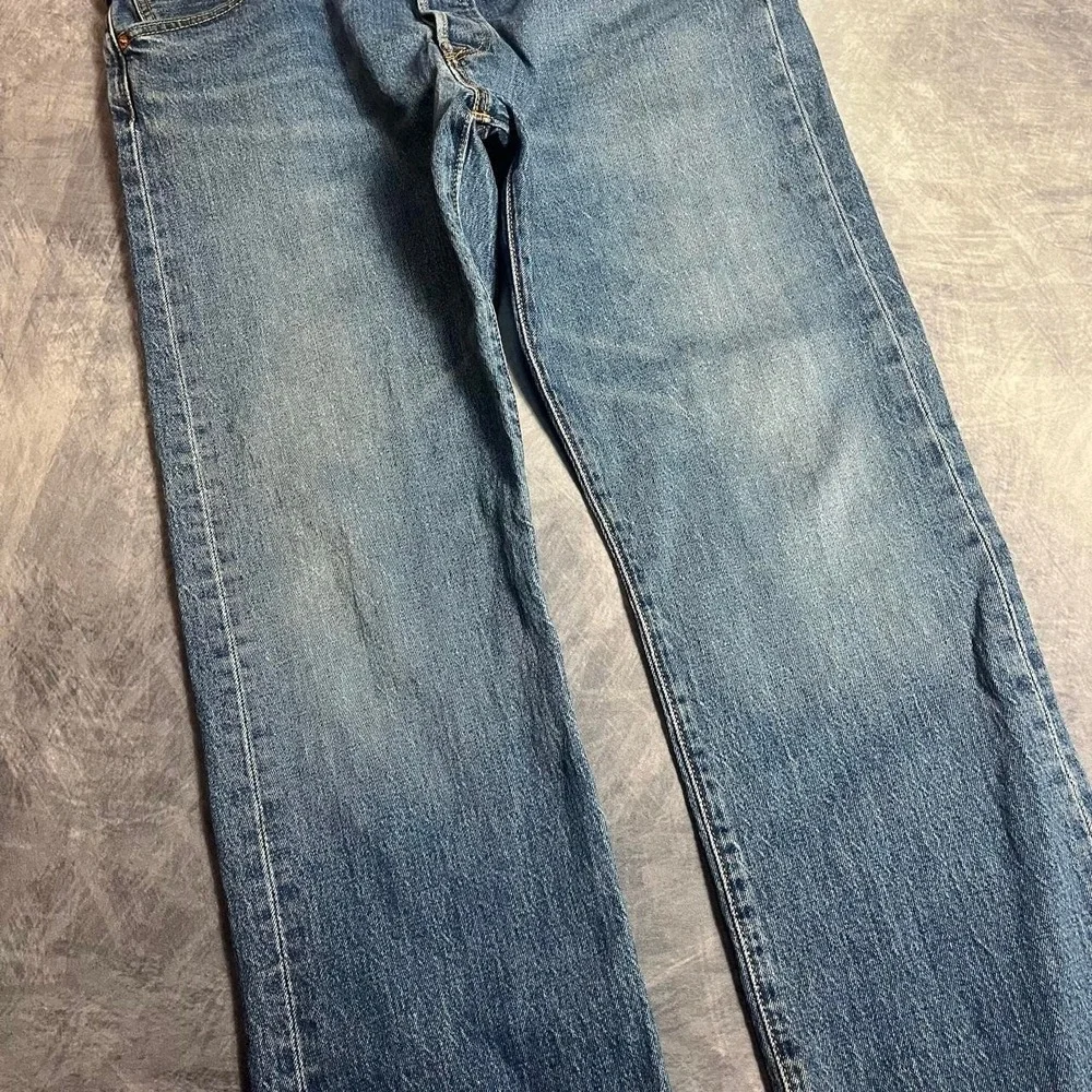 Y2K 2000s Levi's 501 Mid Wash Blue Denim Jeans